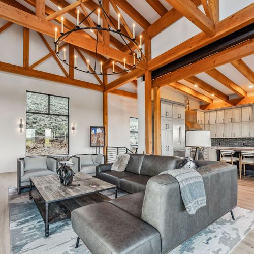 Contemporary living room boasting clean lines, warm textures, bright lighting.