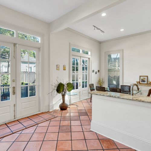 Sunlit dining space with easy access to the private patio.