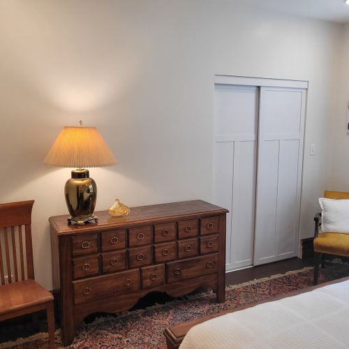 Bedroom #5 (second floor):  features a queen-size bed, dresser, 2 chairs, 2 lamps, and a closet.