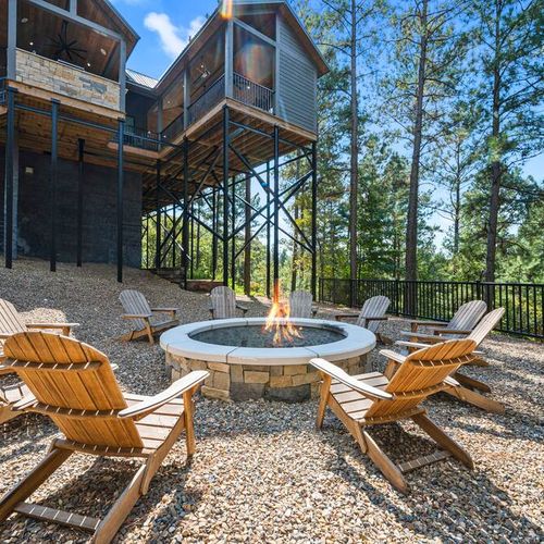 Fire pit with Adirondack chairs