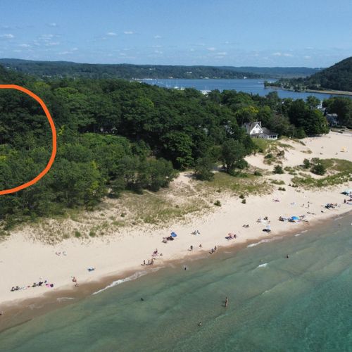 Overall:  the home is in a truly incredible location overlooking lake michigan and frankfort beach.