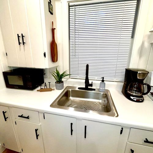 Kitchen:  newly-remodeled kitchen with all appliances except for a dishwasher.