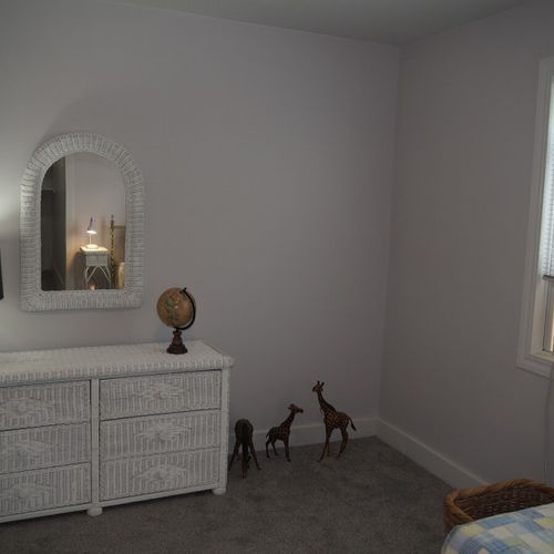 Bedroom #3:  all 3 bedrooms are upstairs. This bedroom features two twin-size beds, a nightstand with a lamp, a dresser with a mirror, and a large closet.