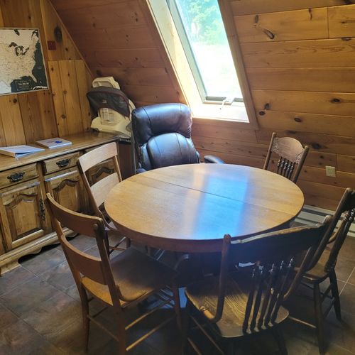 Dining table:  round dining table with seating for 6 adults.