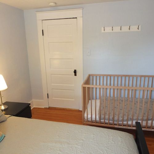 Bedroom #2 (second floor):  this bedroom features a queen-size bed, large closet, nightstands, lamps, and a baby crib! It is on the second floor.