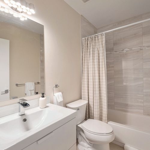 Convenience meets comfort in our full basement bathroom.