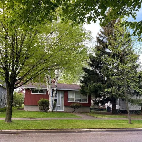 Exterior:  the front of the house in summer.