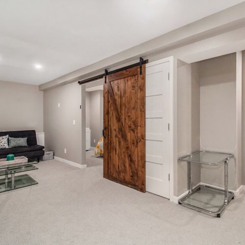Sleeping space for one person on the futon in the basement.
