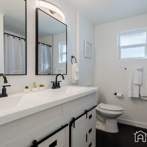 Elevate your morning routine in the newly redone bathroom in the lower level–so clean and spacious!