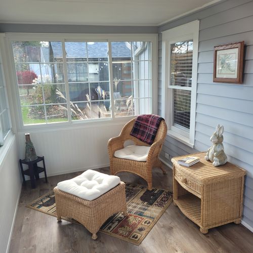 Front porch:  the home has a gorgeous, fully-enclosed front porch that is great for relaxing, chatting, and people-watching.