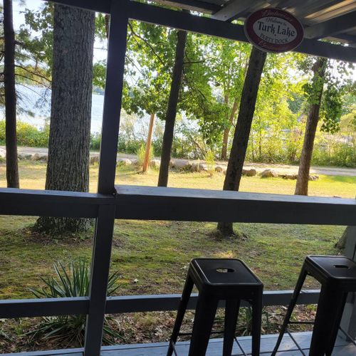 Exterior:  the bar stools on the deck with a nice view of turk lake