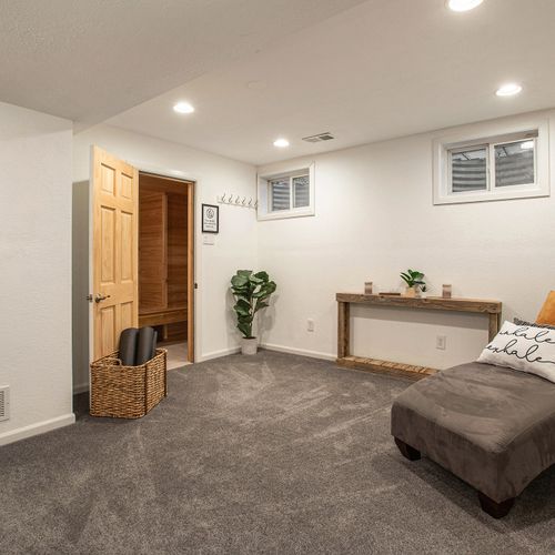 Escape to the finished basement of this home for some rest and relaxation in the yoga room or sauna.