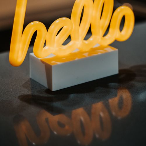 Feel at home as soon as you arrive, greeted by the warm glow of our 'hello' sign, setting a hospitable and cozy tone for your stay.