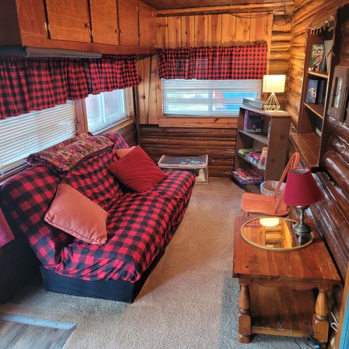 Living room:  there are 2 futons at the front of the living room for additional sleeping capacity.