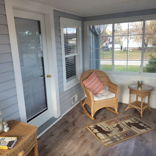 Front porch:  the home has a gorgeous, fully-enclosed front porch that is great for relaxing, chatting, and people-watching.