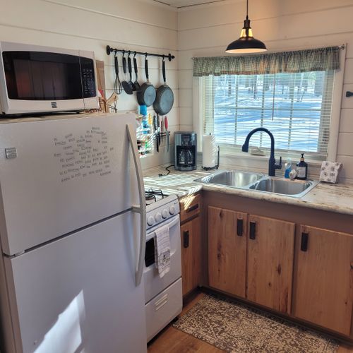 Overall:  the cabin has a cute little kitchen with all appliances except a dishwasher.
