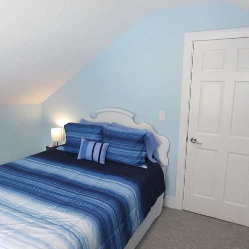 Bedroom #2 (upstairs):  another angle showing the queen-size bed and the bedroom door
