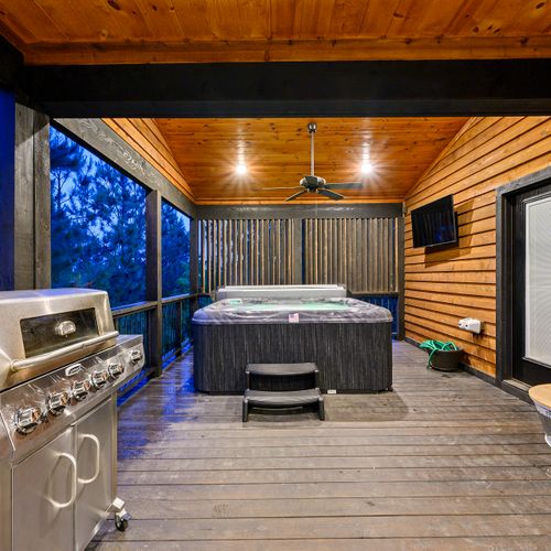 The luxury hot tub and gas grill, propane provided.