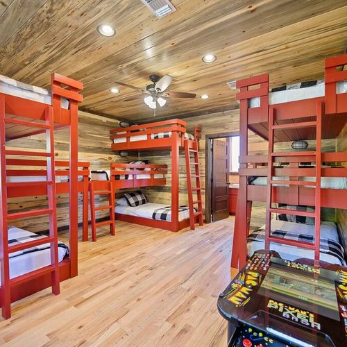 The bunk room with NINE Twin XL beds.