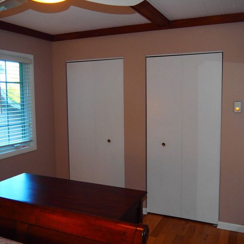 Bedroom #1 (second floor):  features a queen-size bed, nightstands, dresser, ceiling fan, closet, and a private entrance to the second floor bathroom.