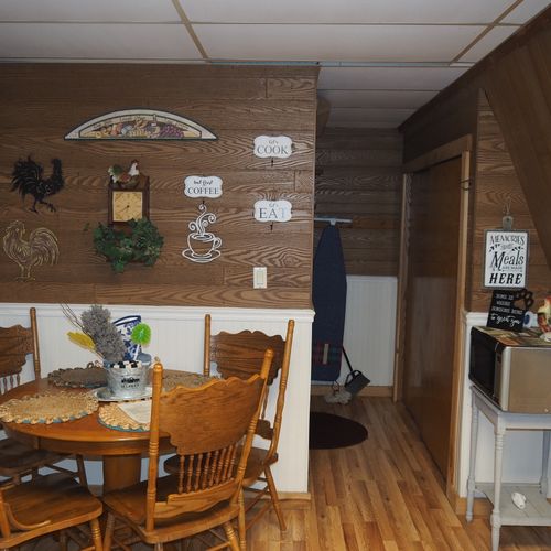 Dining area:  there is a convenient dining table with 4 chairs in the kitchen.