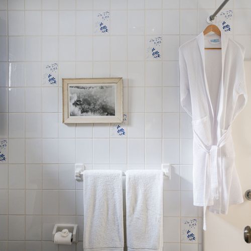 A quaint downstairs bathroom across from bedroom 3