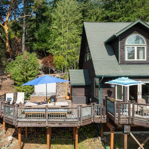 Custom Finnish Sauna with the green roof easily sits four people.