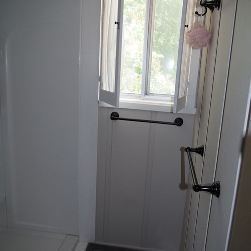 Bathroom #1 (main floor):  full bathroom with shower and toilet on main floor.