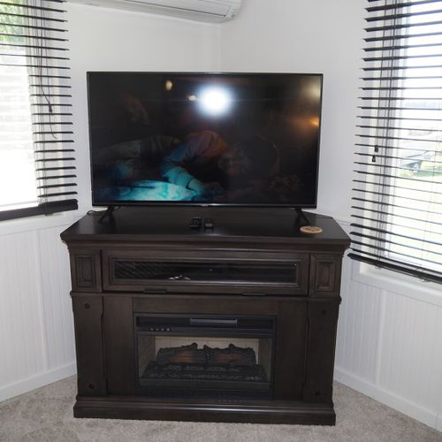 Living room:  the home has a comfy living room with new furniture and a nice view of manistee lake.