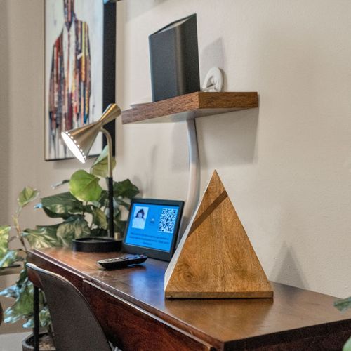 Dedicated work-from-home setup w/ a laptop-ready desk & natural light.