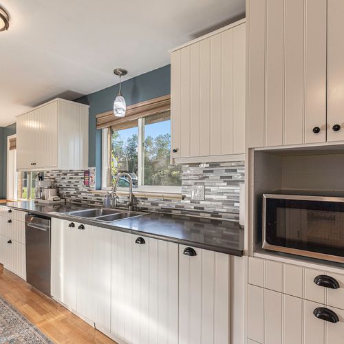 Top-grade appliances and plenty of counter space makes cooking a breeze in this kitchen.