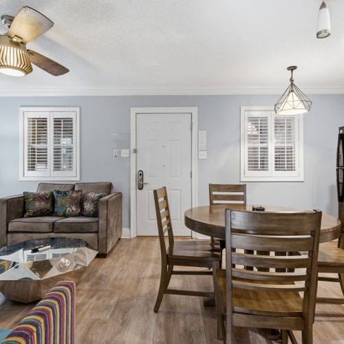 Bright & airy gathering space w/ natural light & room to lounge or dine.