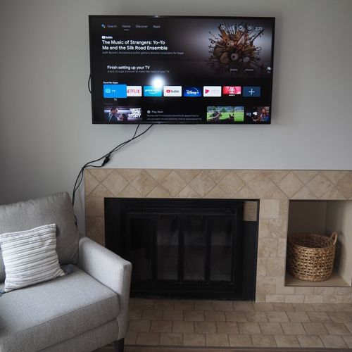 Living room:  features a sofa, comfy chair, ottoman, large screen television, and a desk and chair. (note that guest usage of the fireplace in the living room is strictly prohibited. )