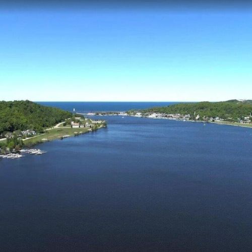 Exterior:  an aerial photo from above betsie lake looking west towards downtown frankfort (on the right), elberta (on the left), and lake michigan (in the middle).