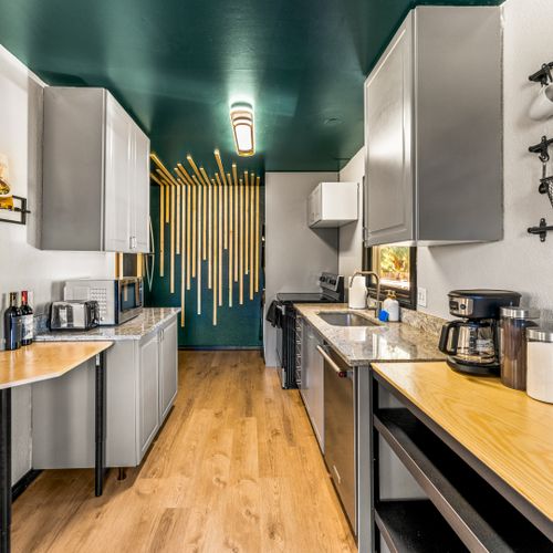 This upper level home features a remodeled kitchen, equipped with all the essentials to whip up your next feast