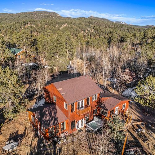 Experience the peaceful seclusion of our remote cabin in the harris park neighborhood of bailey, co, surrounded by stunning mountain landscapes and abundant outdoor activities.