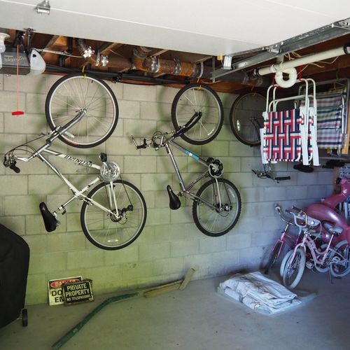 Exterior:  bikes, beach chairs, and a charcoal grill are available in the garage