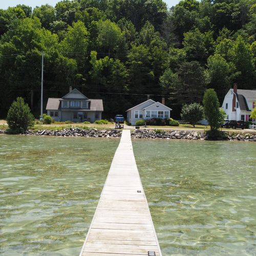 Exterior:  looking back at the house from the end of the private dock.