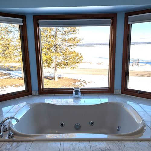 BATHROOM #2 (SECOND FLOOR):  This is a large private ensuite full bathroom for Bedroom #2.  Features a gorgeous jetted bathtub with a great view of Big Platte Lake from the bathtub!