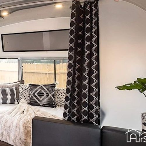 Cozy up in the tastefully appointed queen size bed for a good night's sleep!