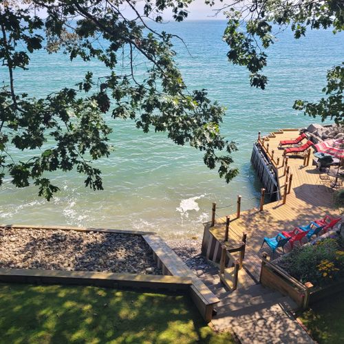 Exterior:  looking down at the private lakefront from the apartment