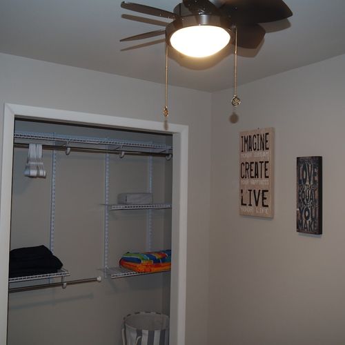 Bedroom #2:  also features a queen-size bed, ceiling fan, and closet.