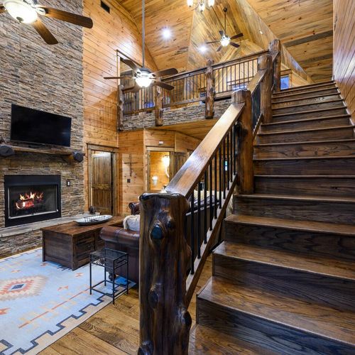 Upstairs leads to the loft and remaining bedrooms.
