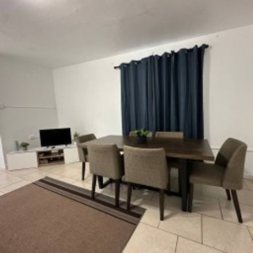 Gather and dine in style! Our spacious dining room features a beautiful 6-seat table, perfectly positioned next to a large window,