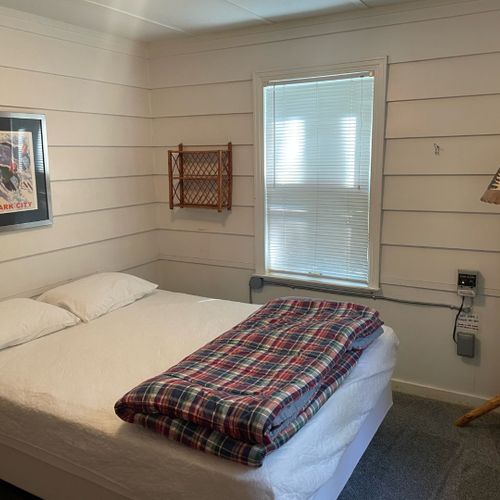 Bedroom #1:  features a queen-size bed. Note that all bedding is provided.