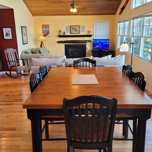 DINING AREA (SECOND FLOOR):  The home has a beautiful dining area with seating for 6 adults and a great view of Crystal Lake.