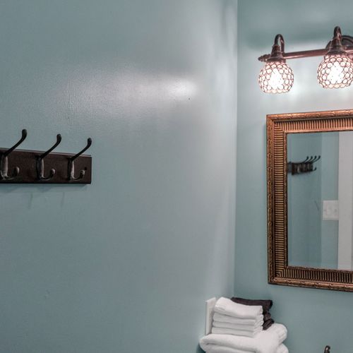 Entryway w/ handy coat hooks to settle in the moment you arrive.