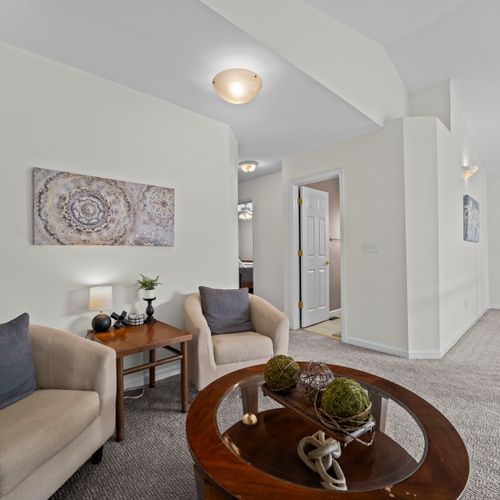 Bright hallway connecting living spaces with simple, modern design