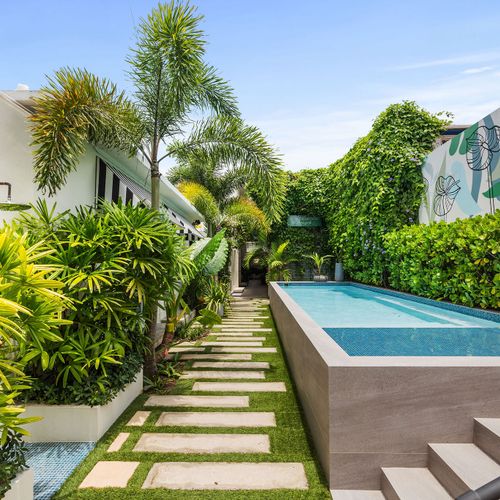 Expansive outdoor area with a sleek pool and fitness zone.