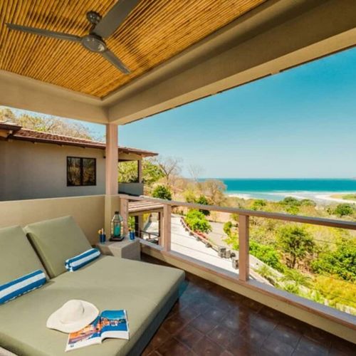 Private patio with lounge chairs to enjoy the beautiful views